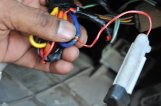 Attaching tracker red wire with switch wire